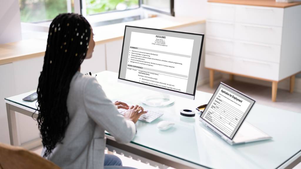 woman writing resume service