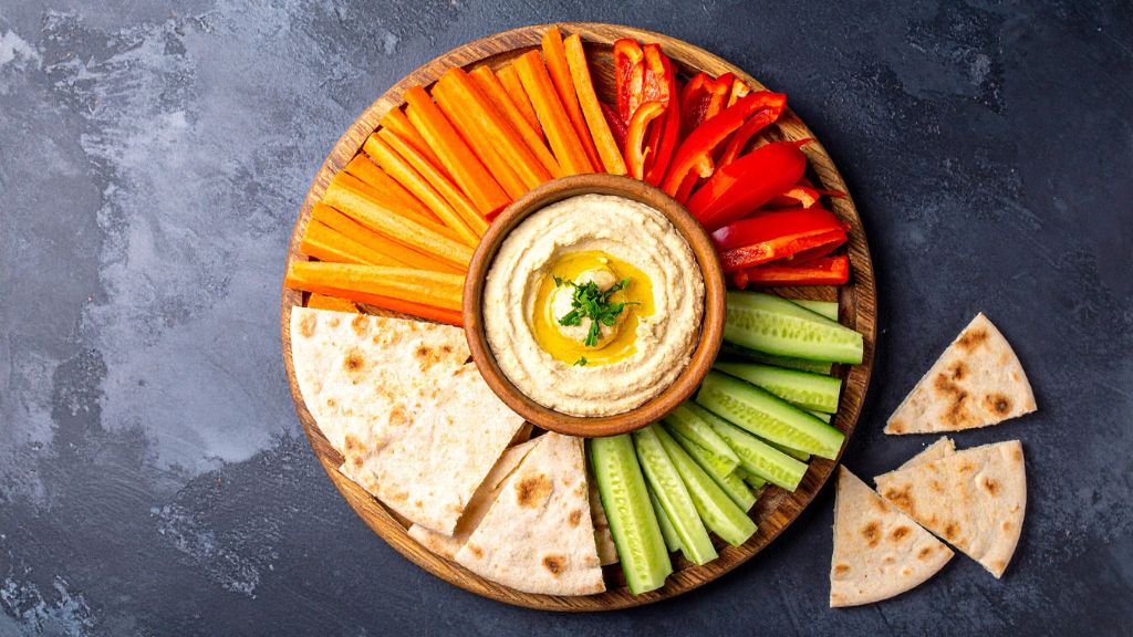 colorful veggie hummus platter