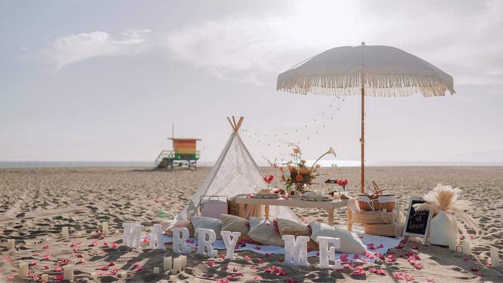 romantic beach proposal setup for event planners.