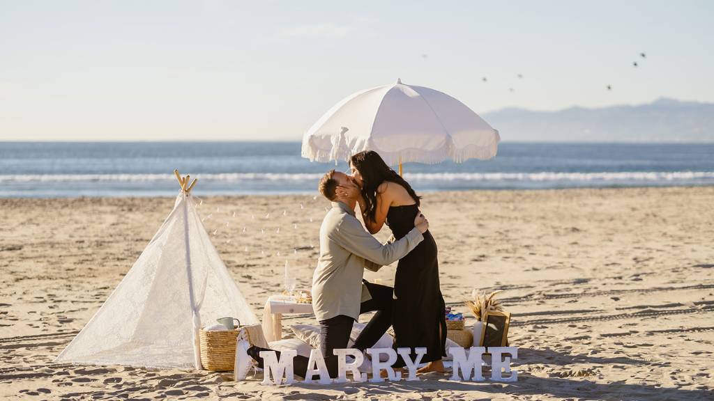 engagement event branding on beach
