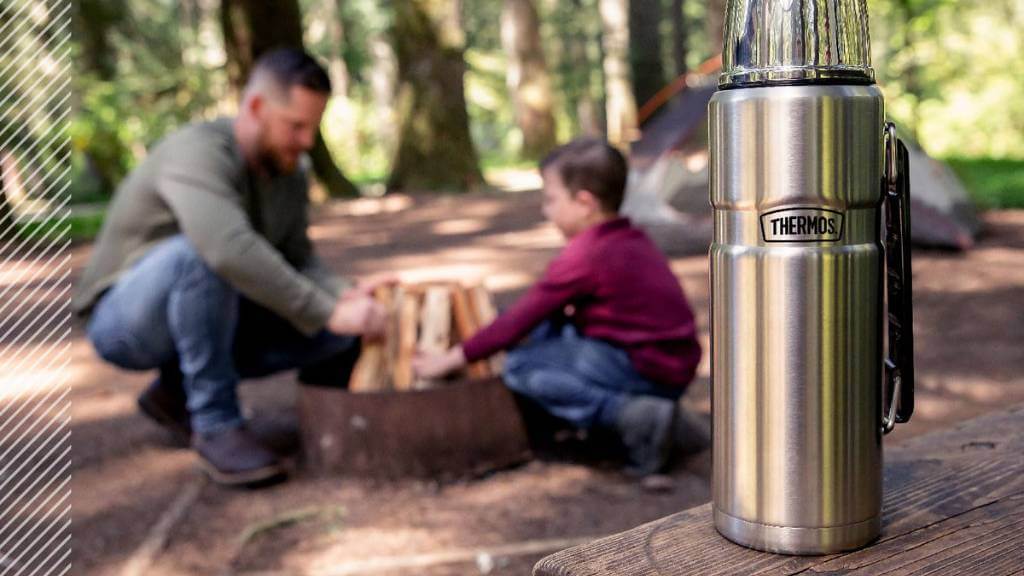 stainless steel thermos at campsite